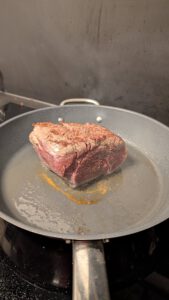 Beef fillet searing in a hot pan